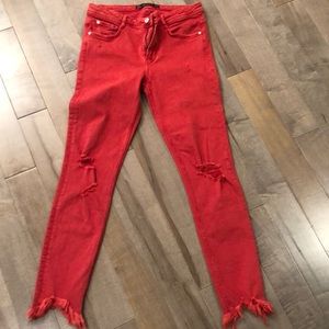 Red ripped jeans